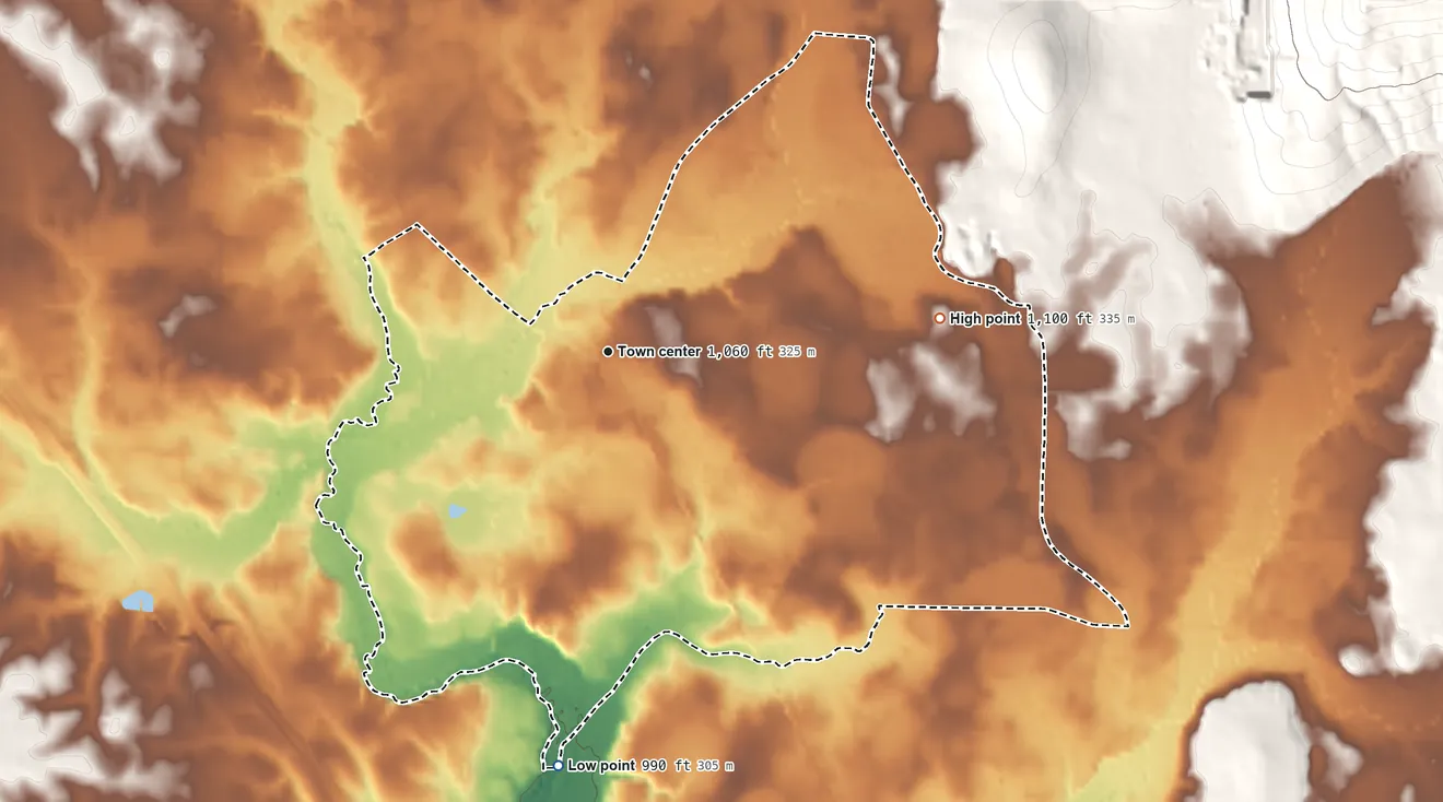 Topographic elevation map of Hillsboro, Tennessee, shaded from 990 ft on the south side to 1,100 ft on the east edge, below higher ground just outside