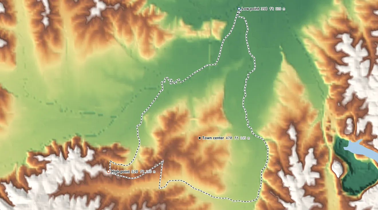 Topographic elevation map of Holladay, Tennessee, shaded from 390 ft on the north side to 520 ft on the west side