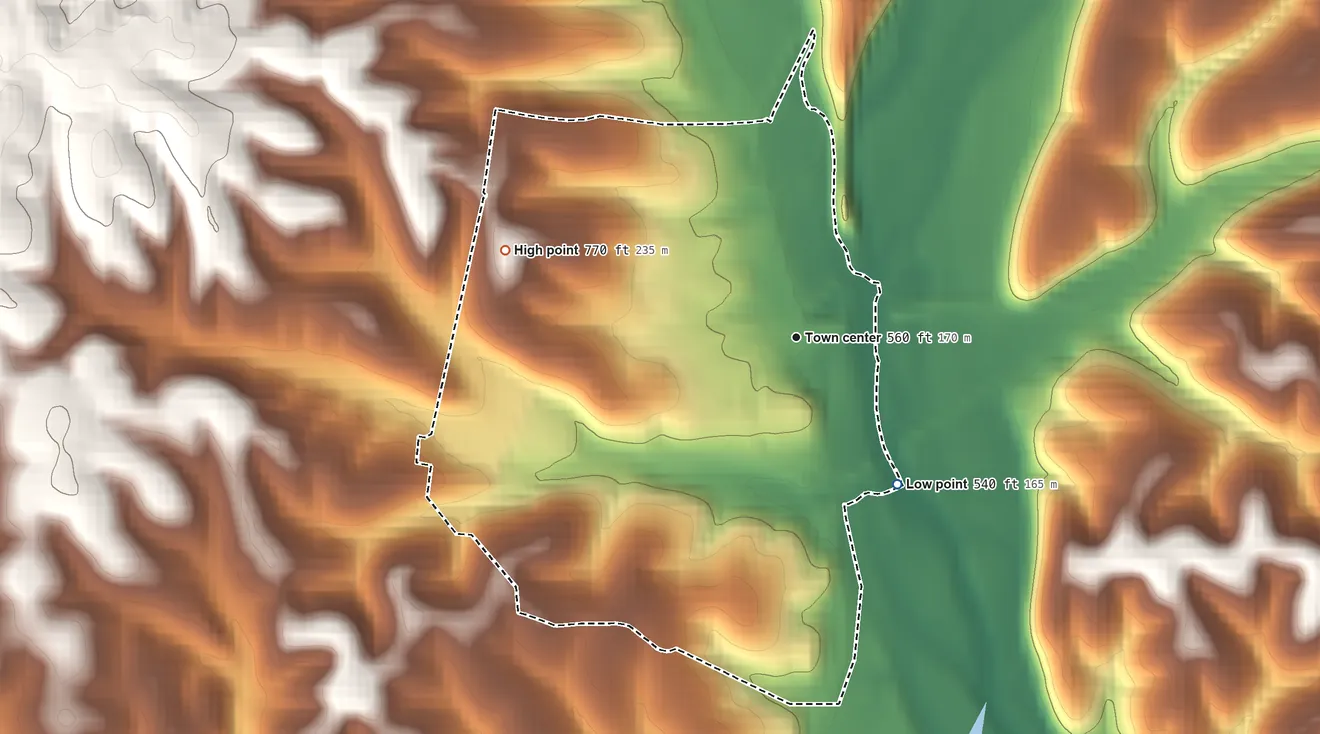 Topographic elevation map of Iron City, Tennessee, shaded from 540 ft on the southeast side to 770 ft on the west side