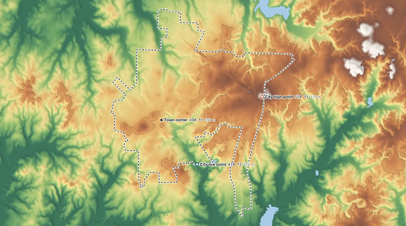 Topographic elevation map of McKenzie, Tennessee, shaded from 410 ft on the southeast side to 570 ft on the east side