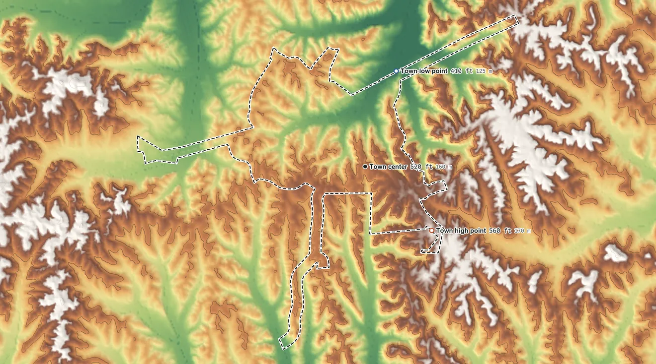 Topographic elevation map of Scotts Hill, Tennessee, shaded from 410 ft on the north side to 560 ft on the southeast side
