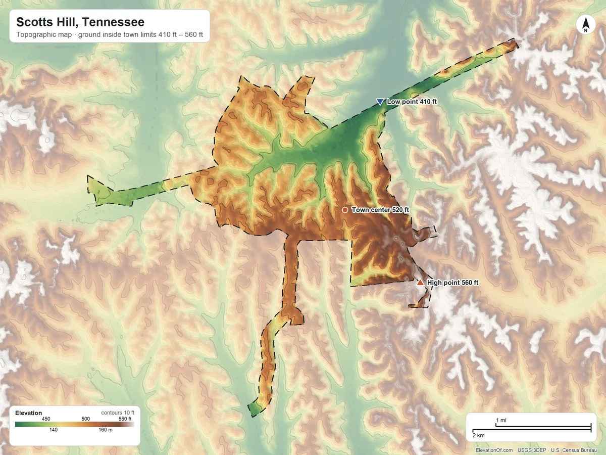 Topographic elevation map of Scotts Hill, Tennessee, shaded from 410 ft on the north side to 560 ft on the southeast side