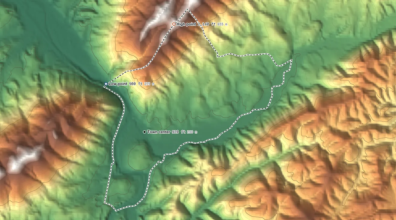 Topographic elevation map of Walland, Tennessee, shaded from 900 ft on the northwest side to 2,140 ft at the foot of the Slate Knobs