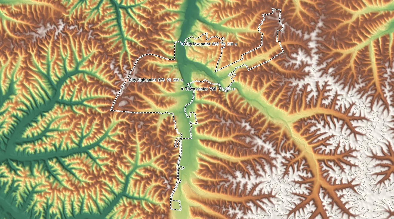 Topographic elevation map of Waynesboro, Tennessee, shaded from 680 ft on the north side to 970 ft on the west side