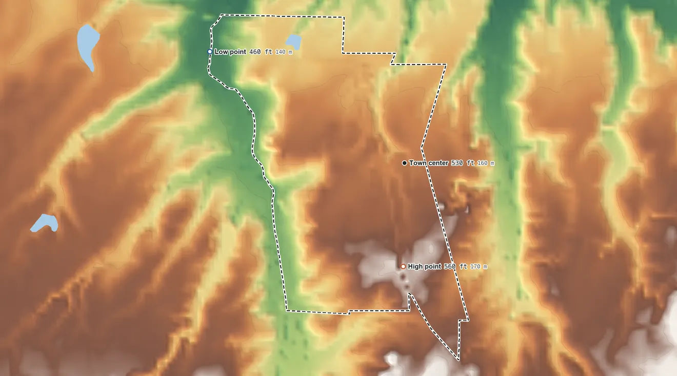 Topographic elevation map of Whitlock, Tennessee, shaded from 460 ft on the northwest side to 560 ft on the south side