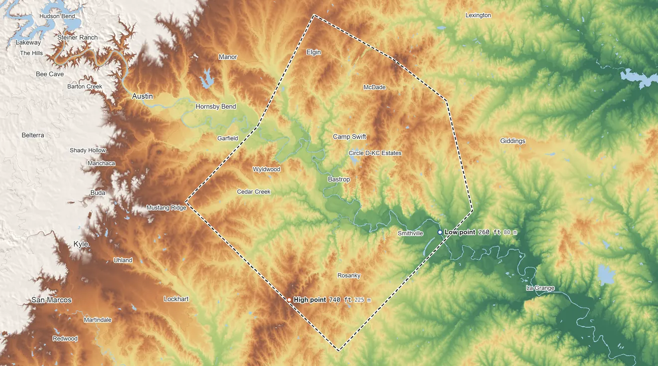Topographic elevation map of Bastrop County, Texas, shaded from 260 ft on the southeast side to 740 ft on the south side