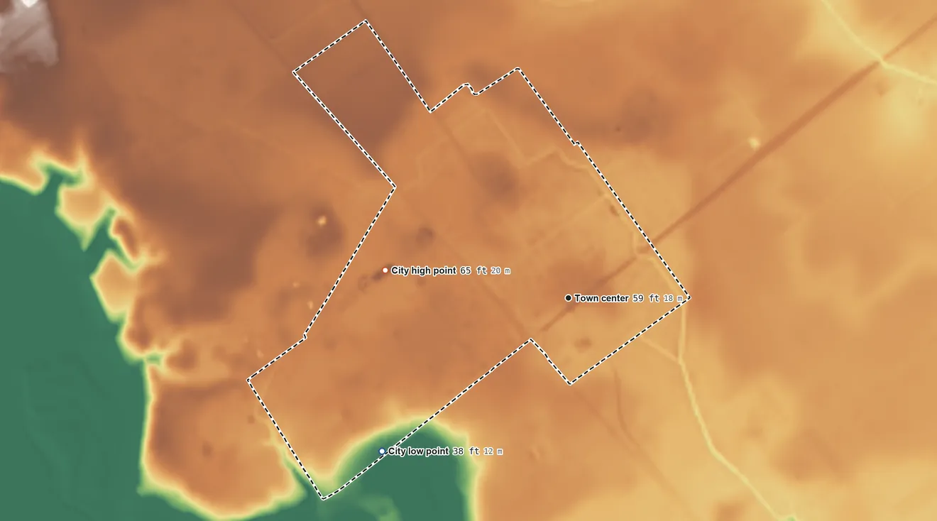 Topographic elevation map of Bloomington, Texas, shaded from 38 ft on the southwest side to 65 ft on the west side