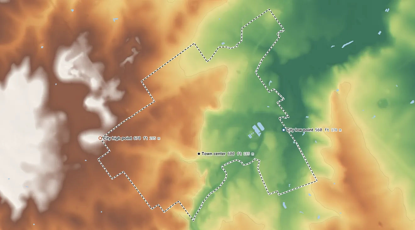 Topographic elevation map of Carrizo Springs, Texas, shaded from 560 ft on the east side to 670 ft on the west side