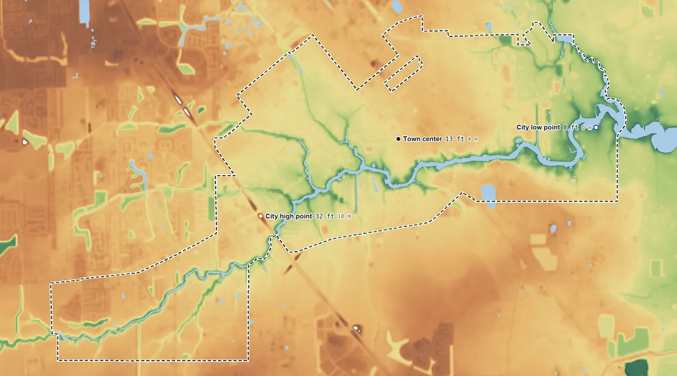 Topographic elevation map of Dickinson, Texas, shaded from 0 ft on the east side to 32 ft on the southwest side