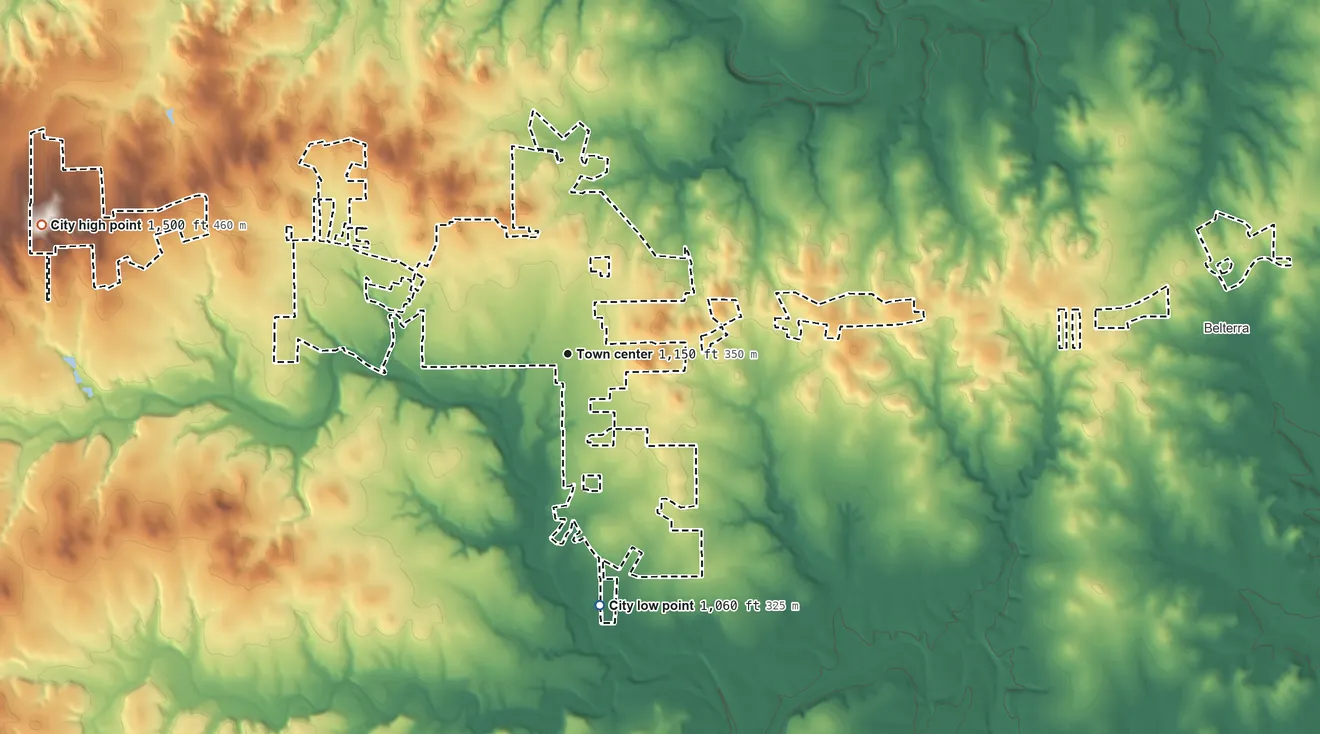 Topographic elevation map of Dripping Springs, Texas, shaded from 1,060 ft on the south side to 1,500 ft on the west side