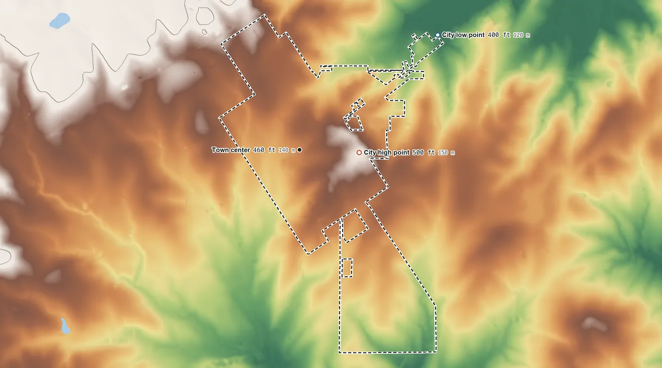 Topographic elevation map of Jourdanton, Texas, shaded from 400 ft on the northeast side to 500 ft on the east side