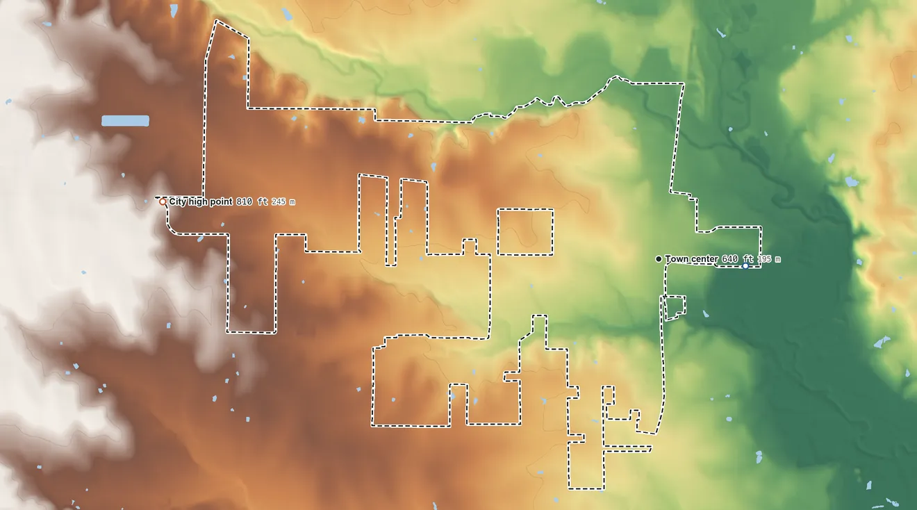 Topographic elevation map of Justin, Texas, shaded from 600 ft on the east side to 810 ft on the west side