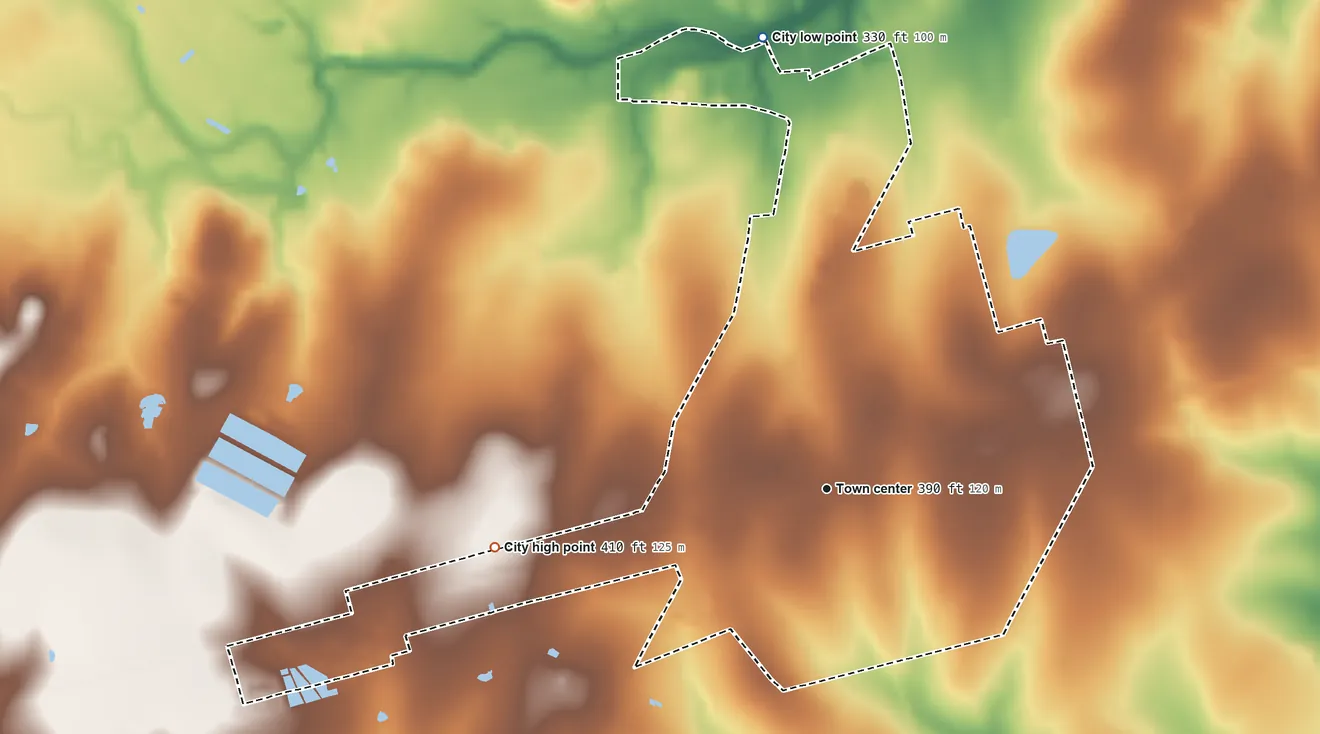 Topographic elevation map of Nixon, Texas, shaded from 330 ft on the north side to 410 ft on the west side