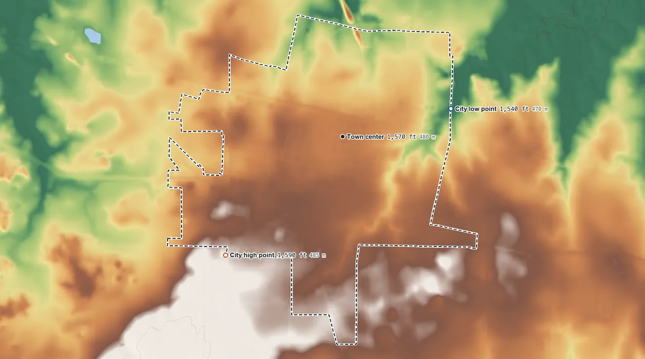 Topographic elevation map of Quanah, Texas, shaded from 1,540 ft on the east side to 1,590 ft on the southwest side