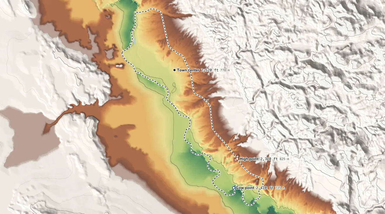 Topographic elevation map of Redford, Texas, shaded from 2,410 ft on the southeast side to 2,710 ft at the foot of the Bofecillos Mountains