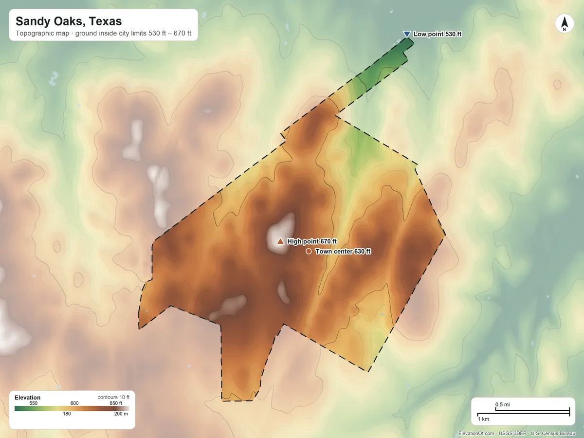 Topographic elevation map of Sandy Oaks, Texas, shaded from 530 ft on the northeast side to 670 ft near the middle