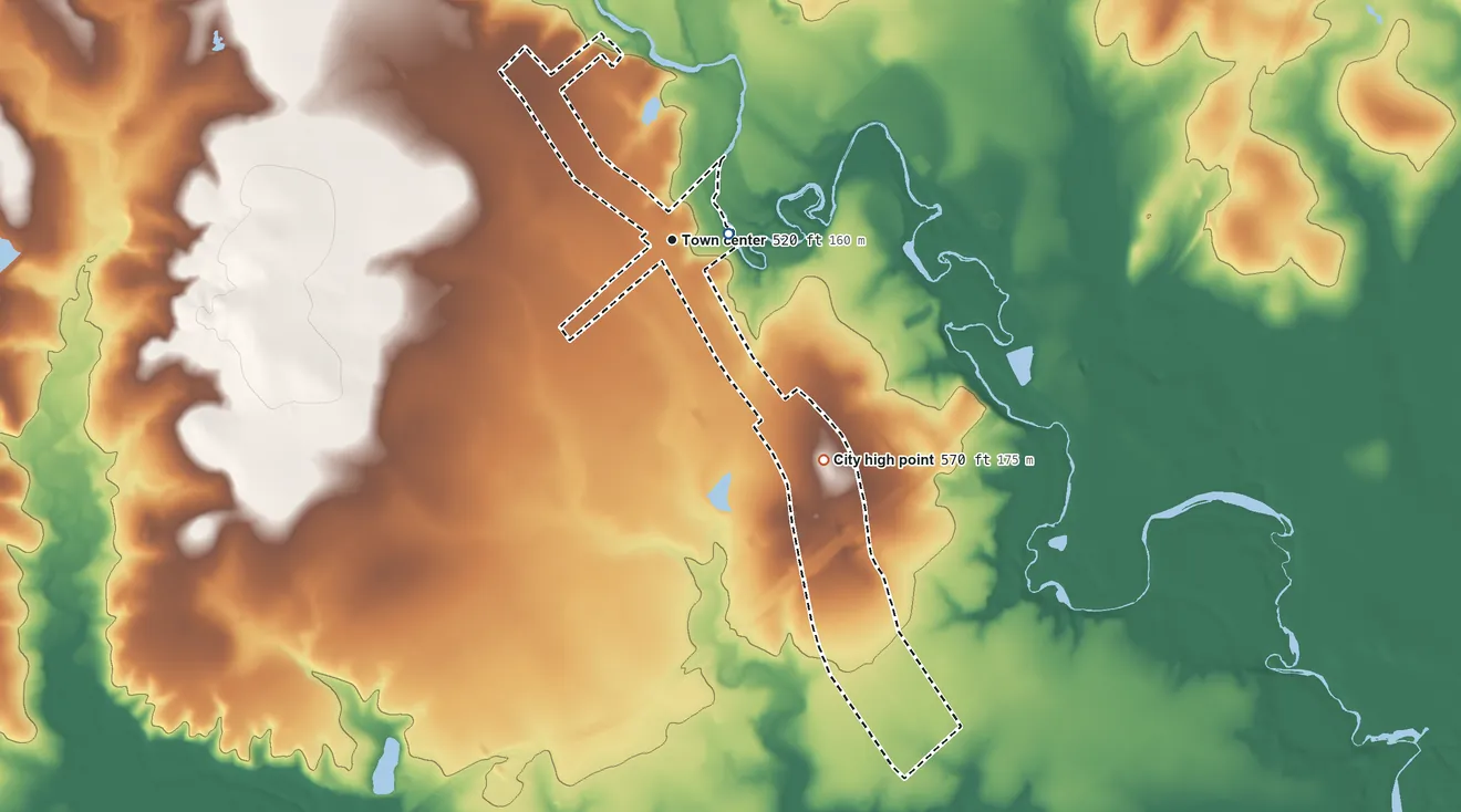 Topographic elevation map of Staples, Texas, shaded from 470 ft near the middle to 570 ft on the southeast side