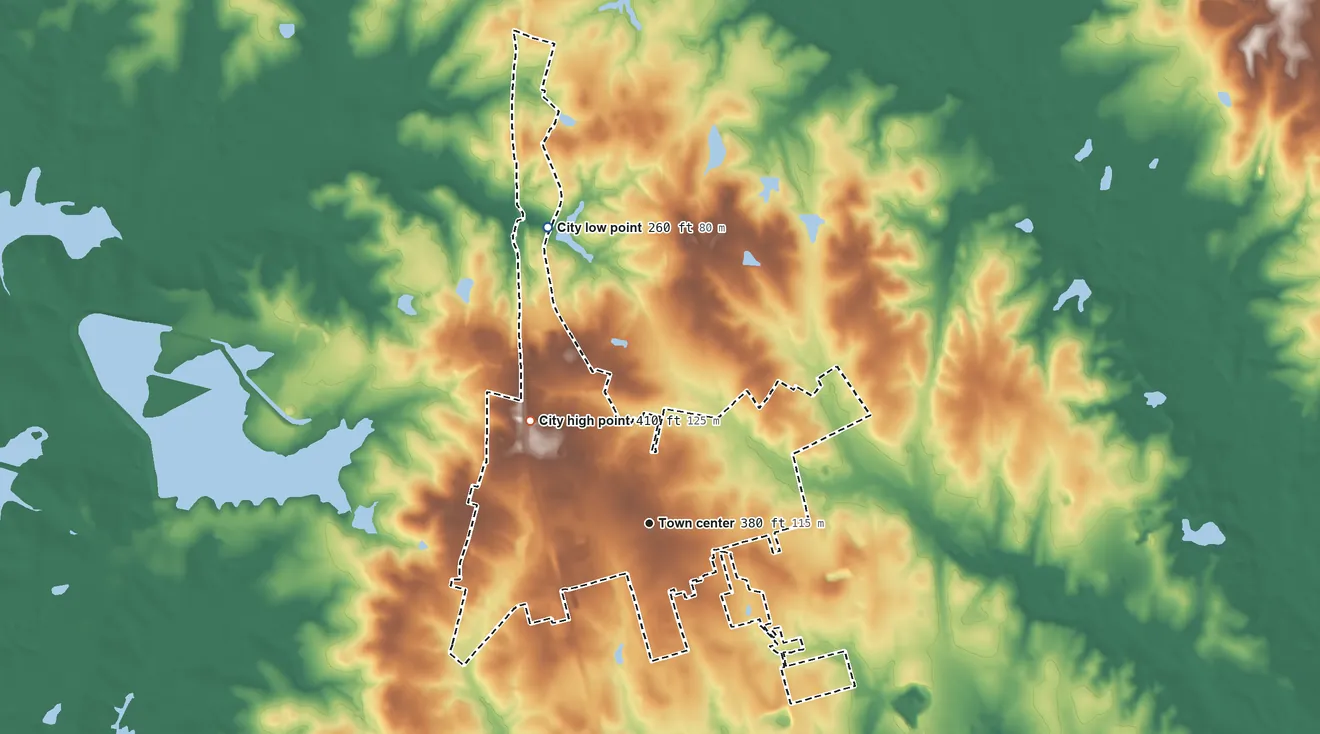 Topographic elevation map of Willis, Texas, shaded from 260 ft on the north side to 410 ft on the northwest side