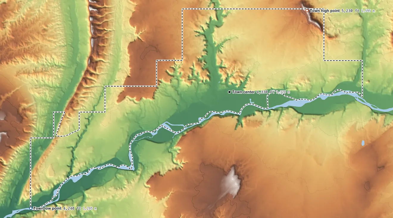 Topographic elevation map of Bluff, Utah, shaded from 4,240 ft on the southwest side to 5,230 ft on the northeast side