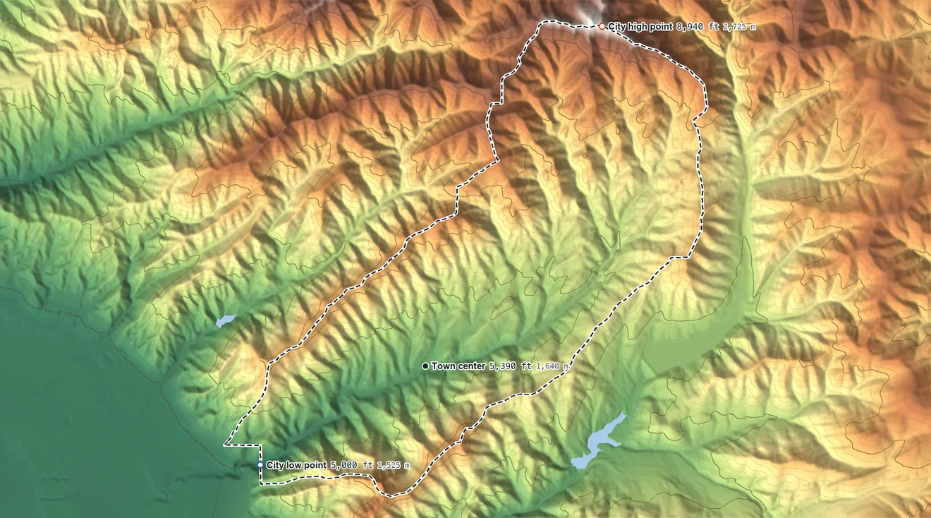 Topographic elevation map of Emigration Canyon, Utah, shaded from 5,000 ft on the southwest side to 8,940 ft on the northeast edge, below higher ground just outside