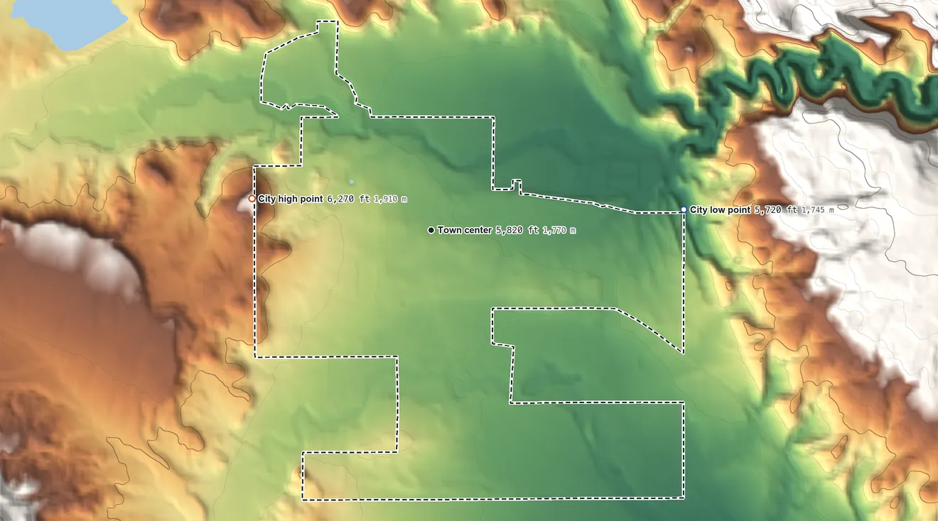 Topographic elevation map of Escalante, Utah, shaded from 5,720 ft on the east side to 6,270 ft on the west side