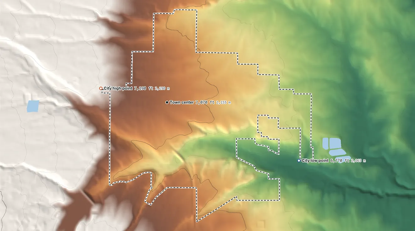 Topographic elevation map of Monticello, Utah, shaded from 6,770 ft on the southeast side to 7,190 ft at the foot of the Abajo Mountains