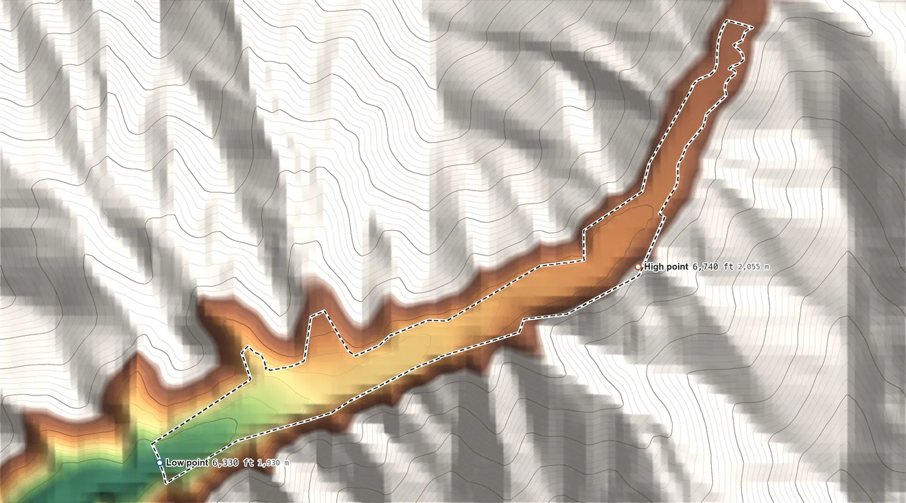 Topographic elevation map of Ophir, Utah, shaded from 6,330 ft on the west side to 6,740 ft at the foot of the Oquirrh Mountains