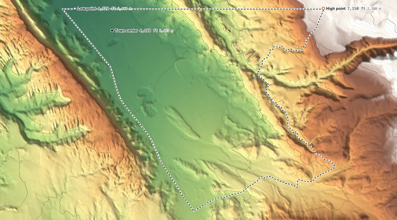 Topographic elevation map of Spanish Valley, Utah, shaded from 4,720 ft on the northwest side to 7,150 ft at the foot of the La Sal Mountains