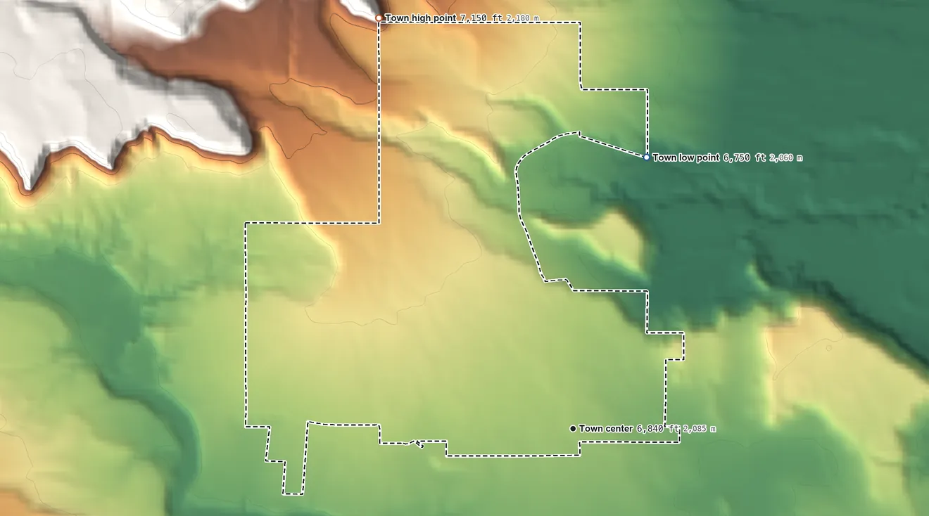 Topographic elevation map of Torrey, Utah, shaded from 6,750 ft on the north side to 7,150 ft at the foot of the The Potholes