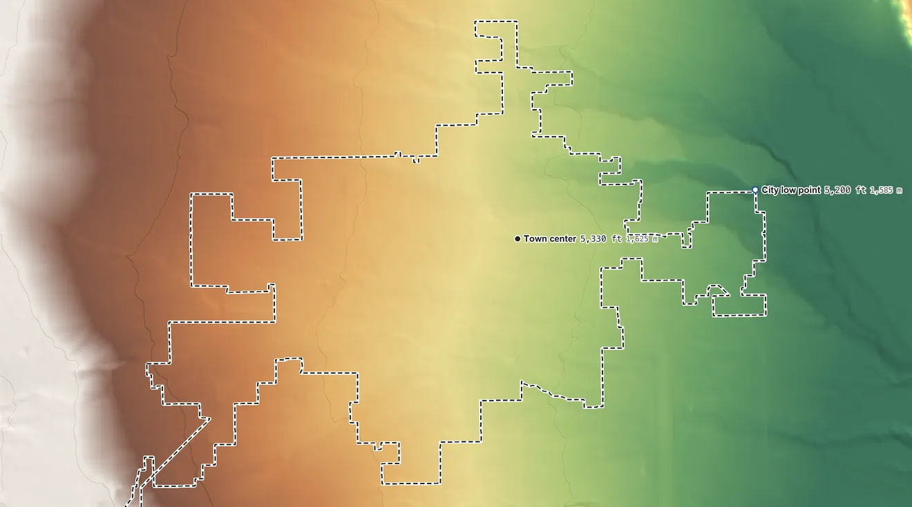 Topographic elevation map of Vernal, Utah, shaded from 5,200 ft on the east side to 5,590 ft on the southwest edge, below higher ground just outside