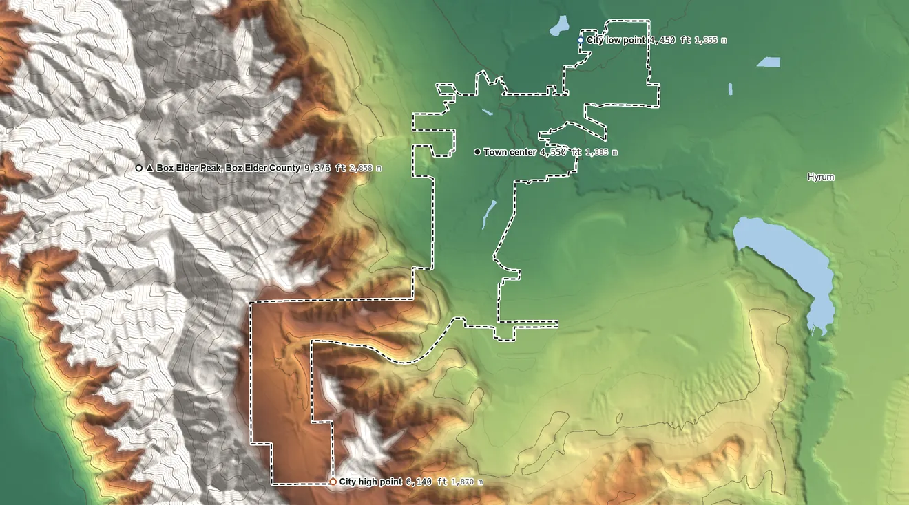 Topographic elevation map of Wellsville, Utah, shaded from 4,450 ft on the northeast side to 6,140 ft at the foot of the Wellsville Mountains
