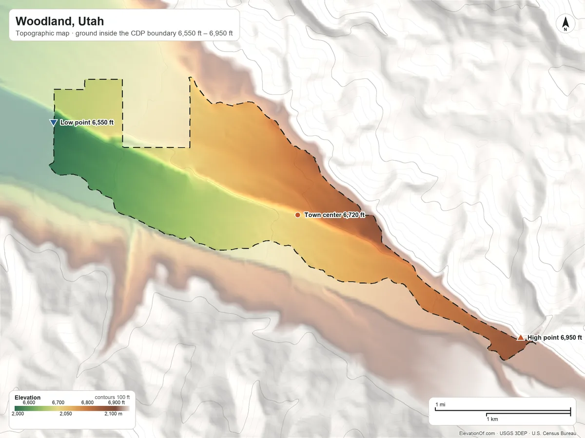 Topographic elevation map of Woodland, Utah, shaded from 6,550 ft on the west side to 6,950 ft at the foot of the The West Hills