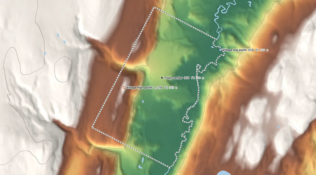 Topographic elevation map of Village of Albany, Vermont, shaded from 850 ft on the northeast side to 1,290 ft at the foot of the Lowell Mountains