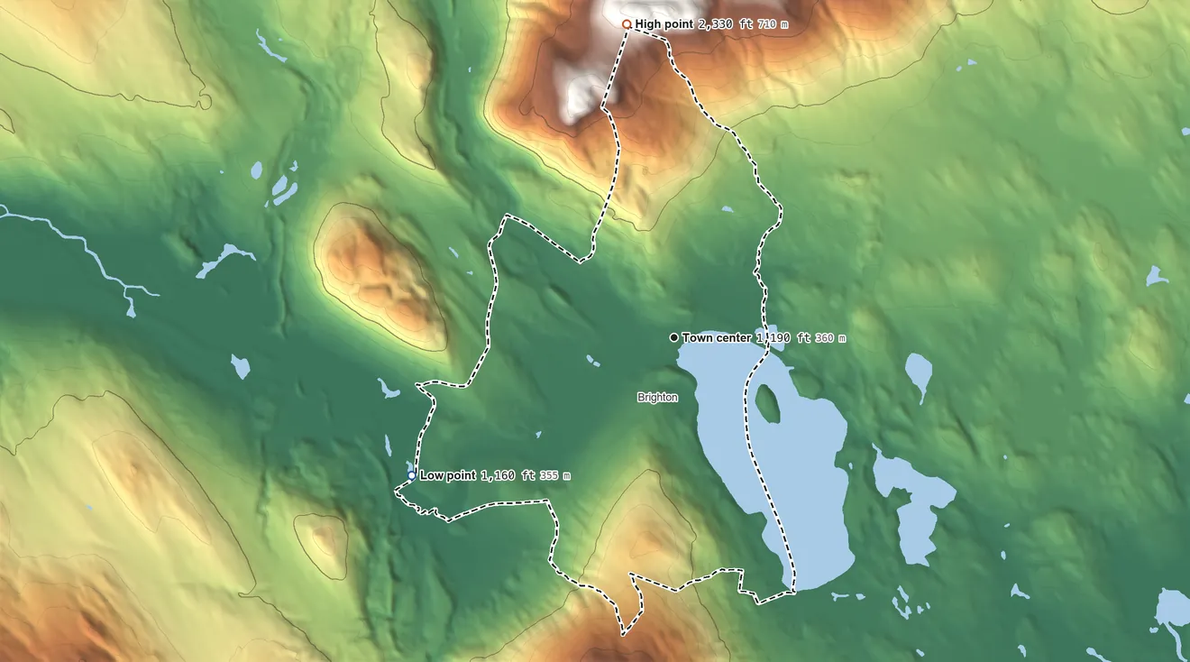 Topographic elevation map of Island Pond, Vermont, shaded from 1,160 ft on the southwest side to 2,330 ft at the foot of the East Haven Range