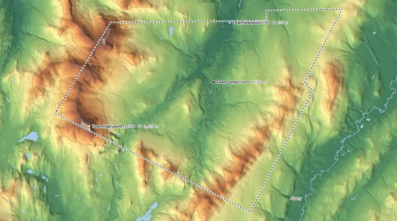 Topographic elevation map of Lowell, Vermont, shaded from 780 ft on the north side to 3,352 ft on Belvidere Mountain