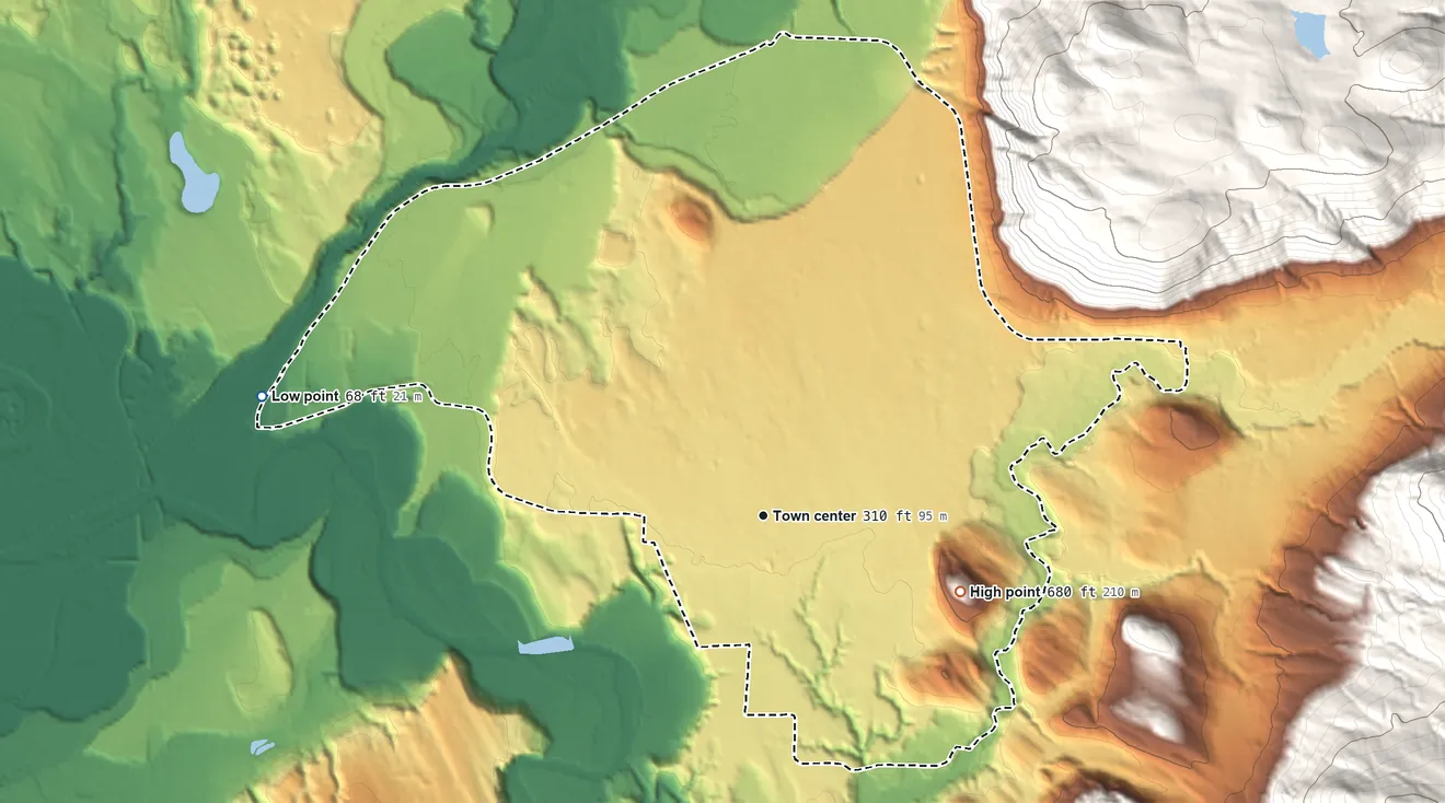 Topographic elevation map of Arlington Heights, Washington, shaded from 68 ft on the west side to 680 ft on the east edge, below higher ground just outside