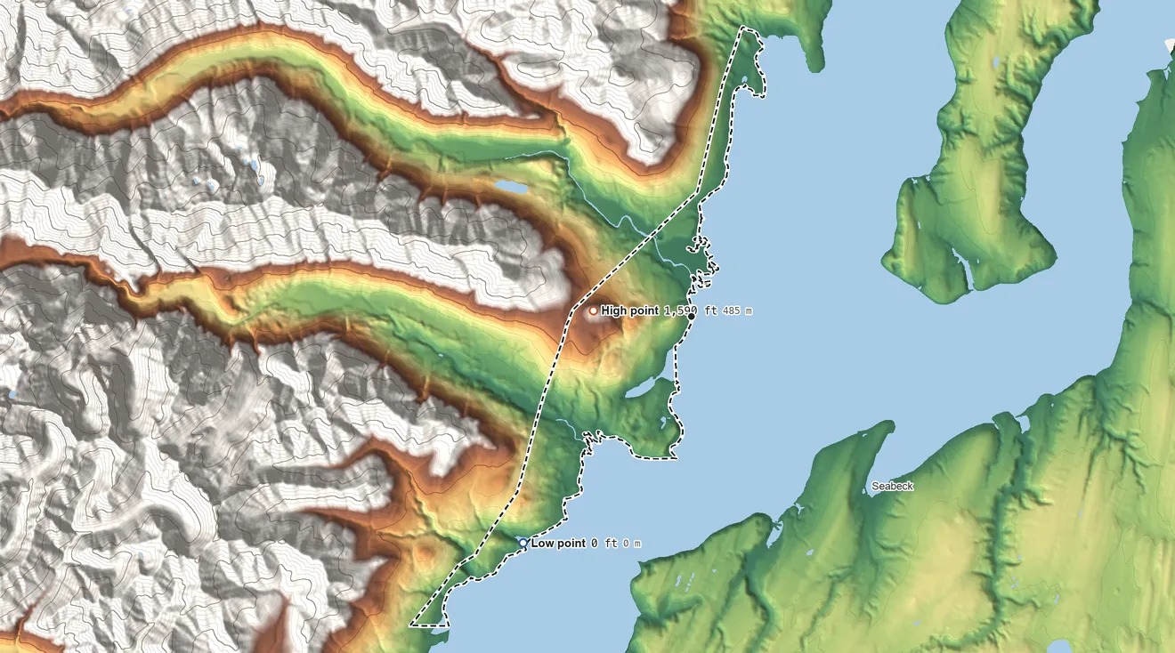 Topographic elevation map of Brinnon, Washington, shaded from sea level level on the Salish Sea to 1,590 ft at the foot of the Quilcene Range