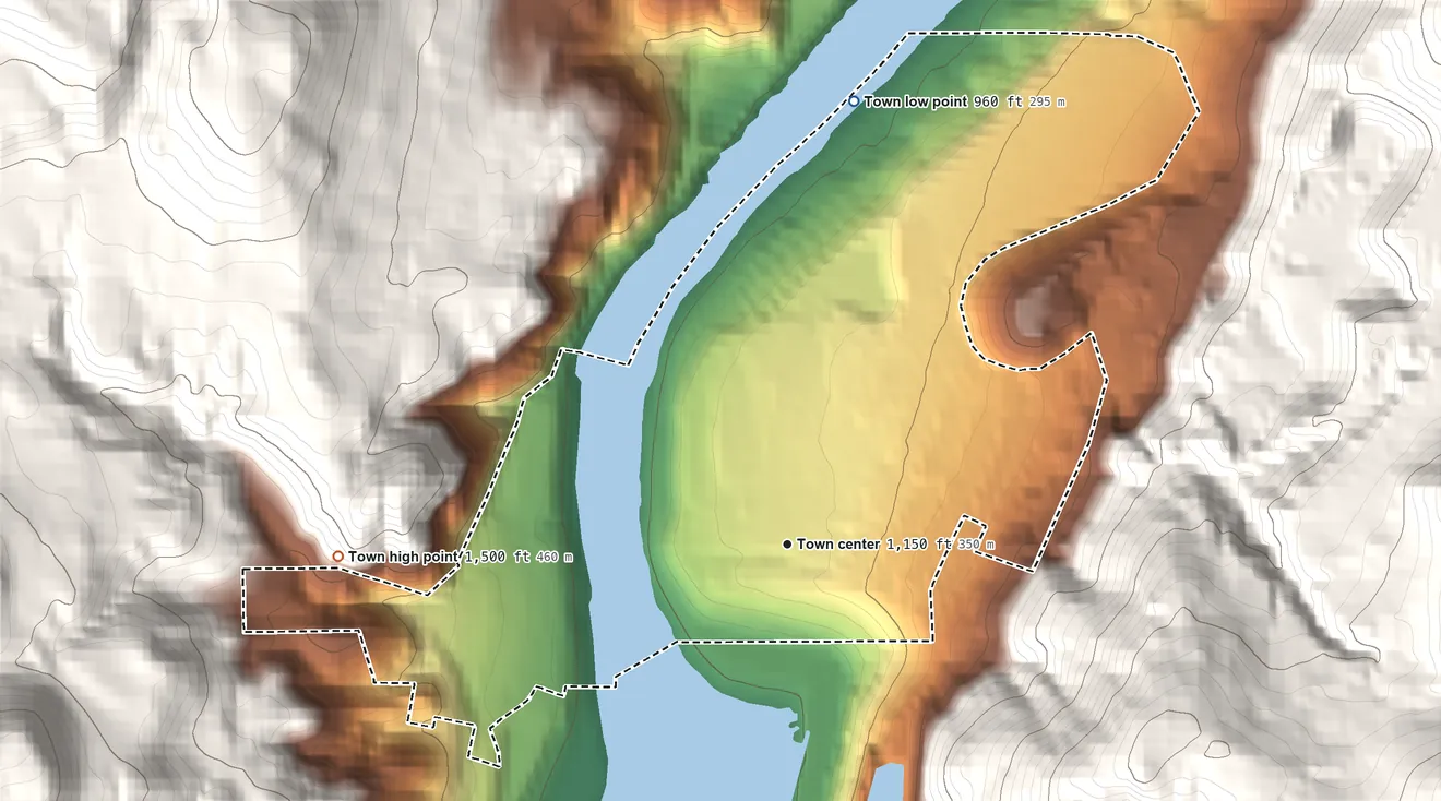 Topographic elevation map of Coulee Dam, Washington, shaded from 960 ft on the north side to 1,500 ft on the west edge, below higher ground just outside