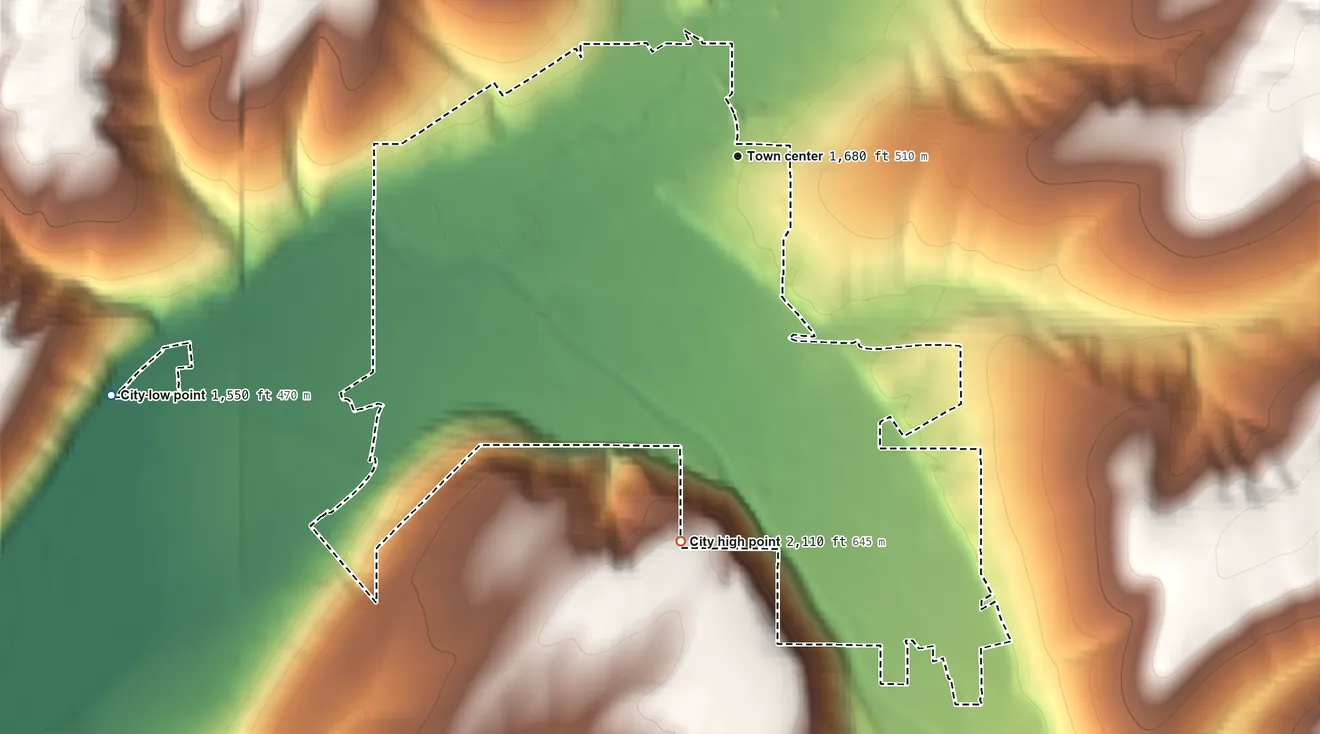 Topographic elevation map of Dayton, Washington, shaded from 1,550 ft on the west side to 2,110 ft on the south side