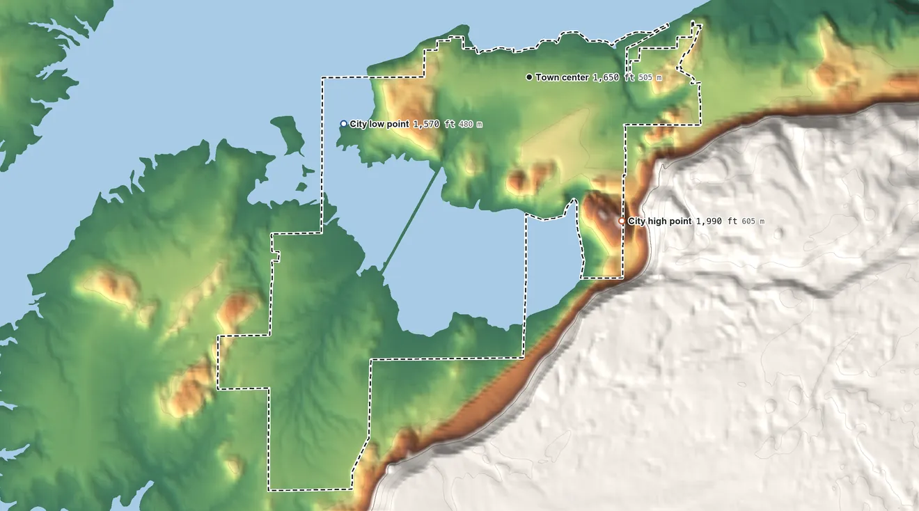 Topographic elevation map of Electric City, Washington, shaded from 1,570 ft on the west side to 1,990 ft on the southeast edge, below higher ground just outside