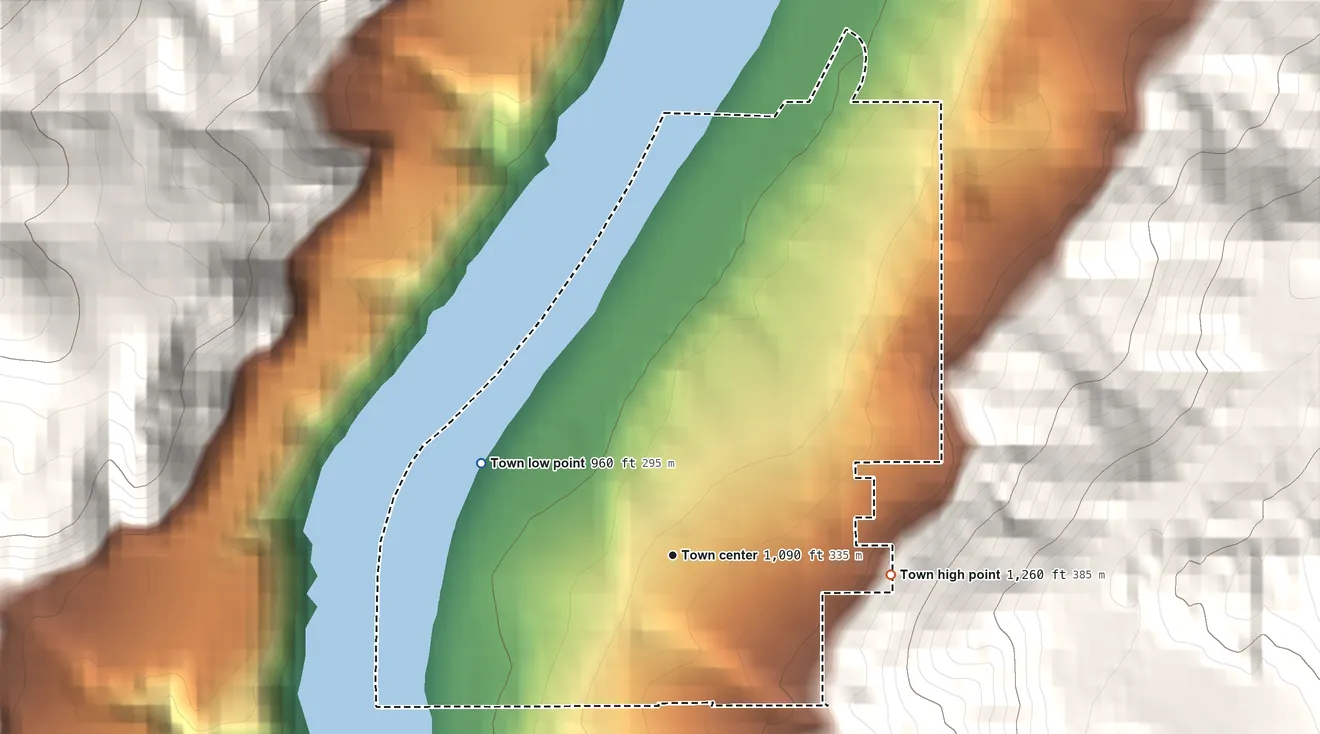 Topographic elevation map of Elmer City, Washington, shaded from 960 ft on the northwest side to 1,260 ft on the east edge, below higher ground just outside