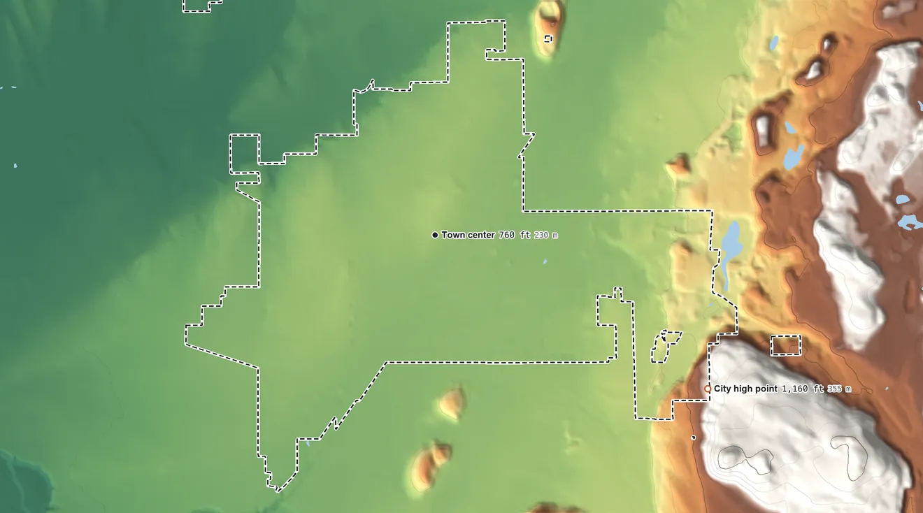 Topographic elevation map of Enumclaw, Washington, shaded from 640 ft on the northwest side to 1,160 ft on the southeast edge, below higher ground just outside