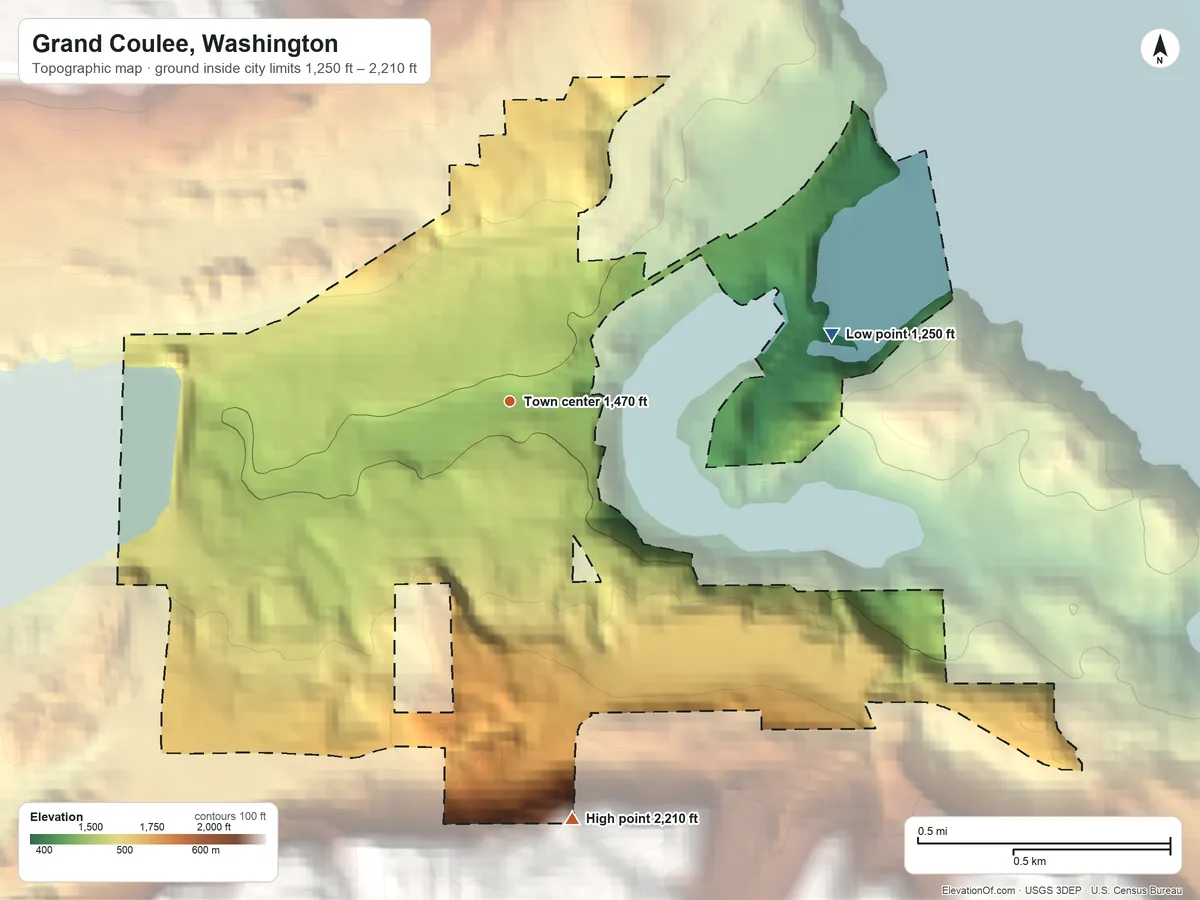 Topographic elevation map of Grand Coulee, Washington, shaded from 1,250 ft on the east side to 2,210 ft on the south side
