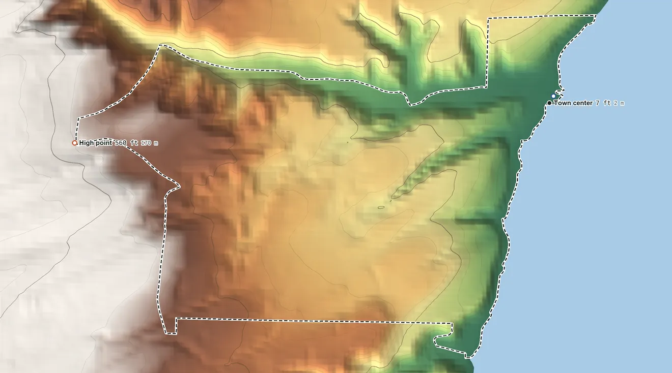 Topographic elevation map of Hoodsport, Washington, shaded from 10 ft near the middle to 560 ft on the west edge, below higher ground just outside
