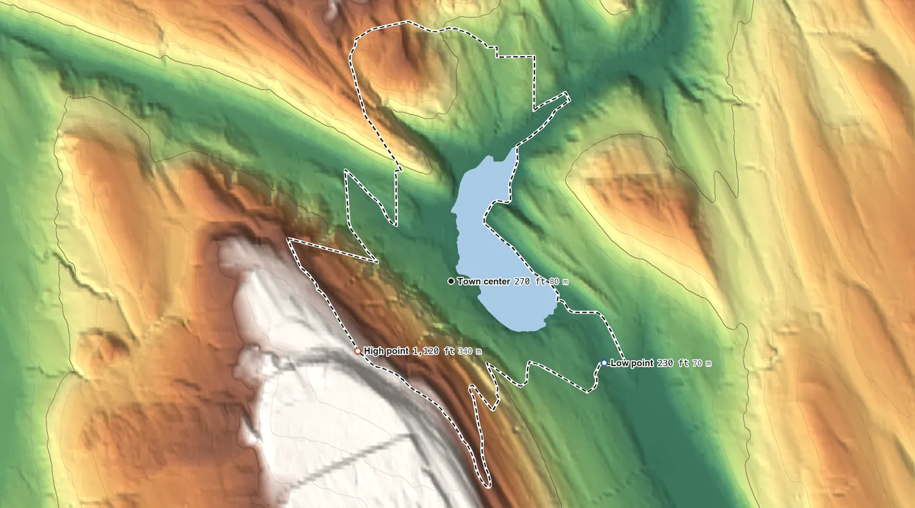 Topographic elevation map of Lake McMurray, Washington, shaded from 230 ft on the southeast side to 1,120 ft on the southwest side