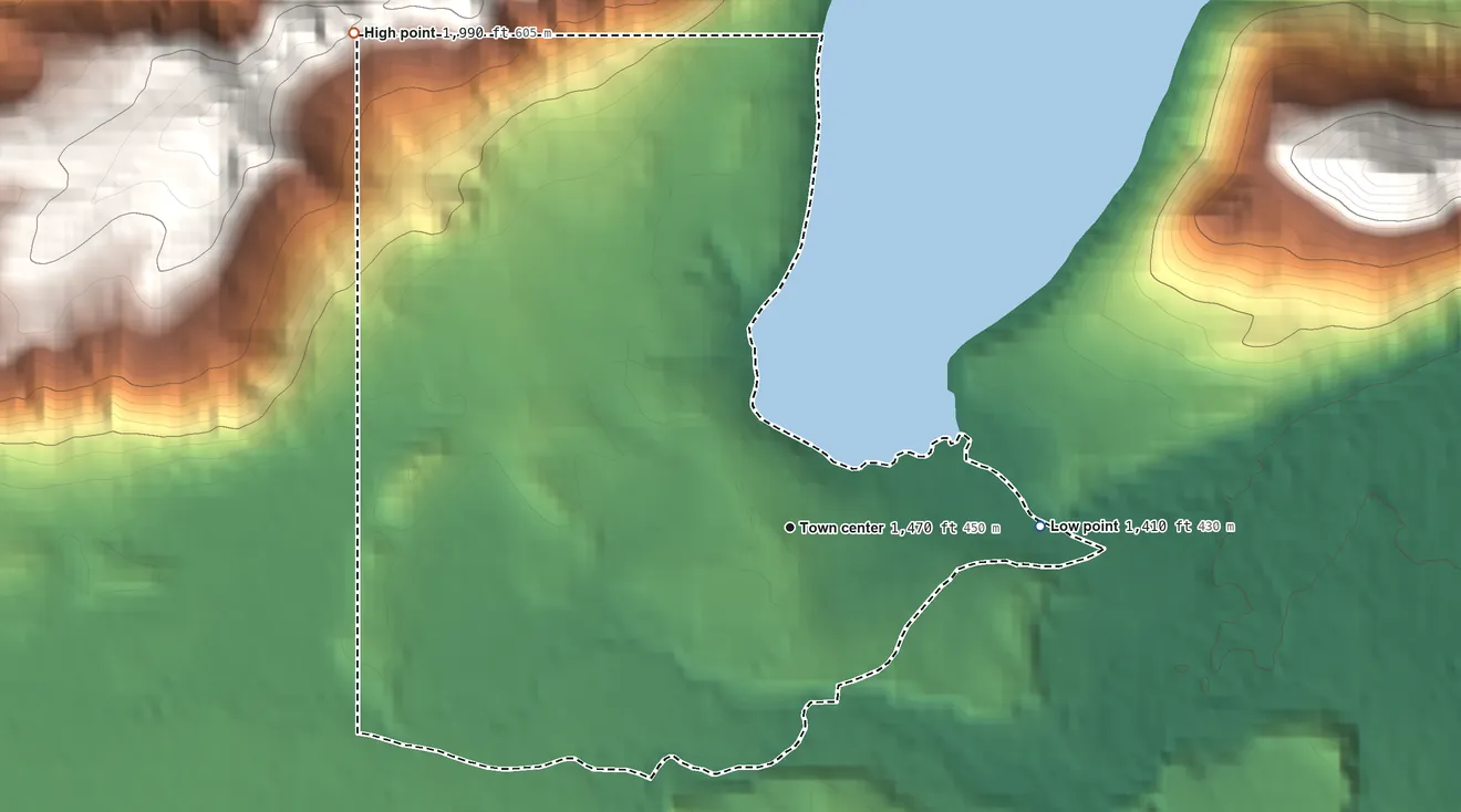 Topographic elevation map of Mineral, Washington, shaded from 1,410 ft on the east side to 1,990 ft on the northwest edge, below higher ground just outside