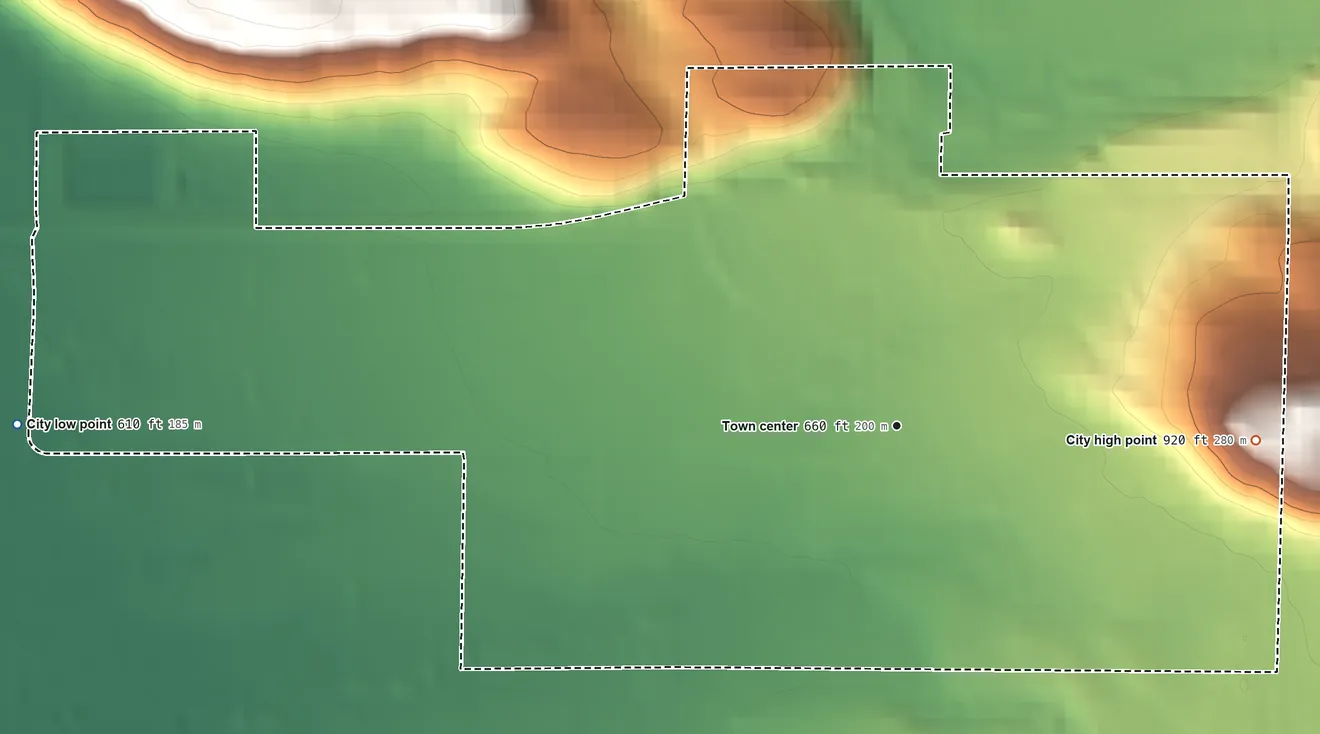 Topographic elevation map of Mossyrock, Washington, shaded from 610 ft on the west side to 920 ft on the east edge, below higher ground just outside