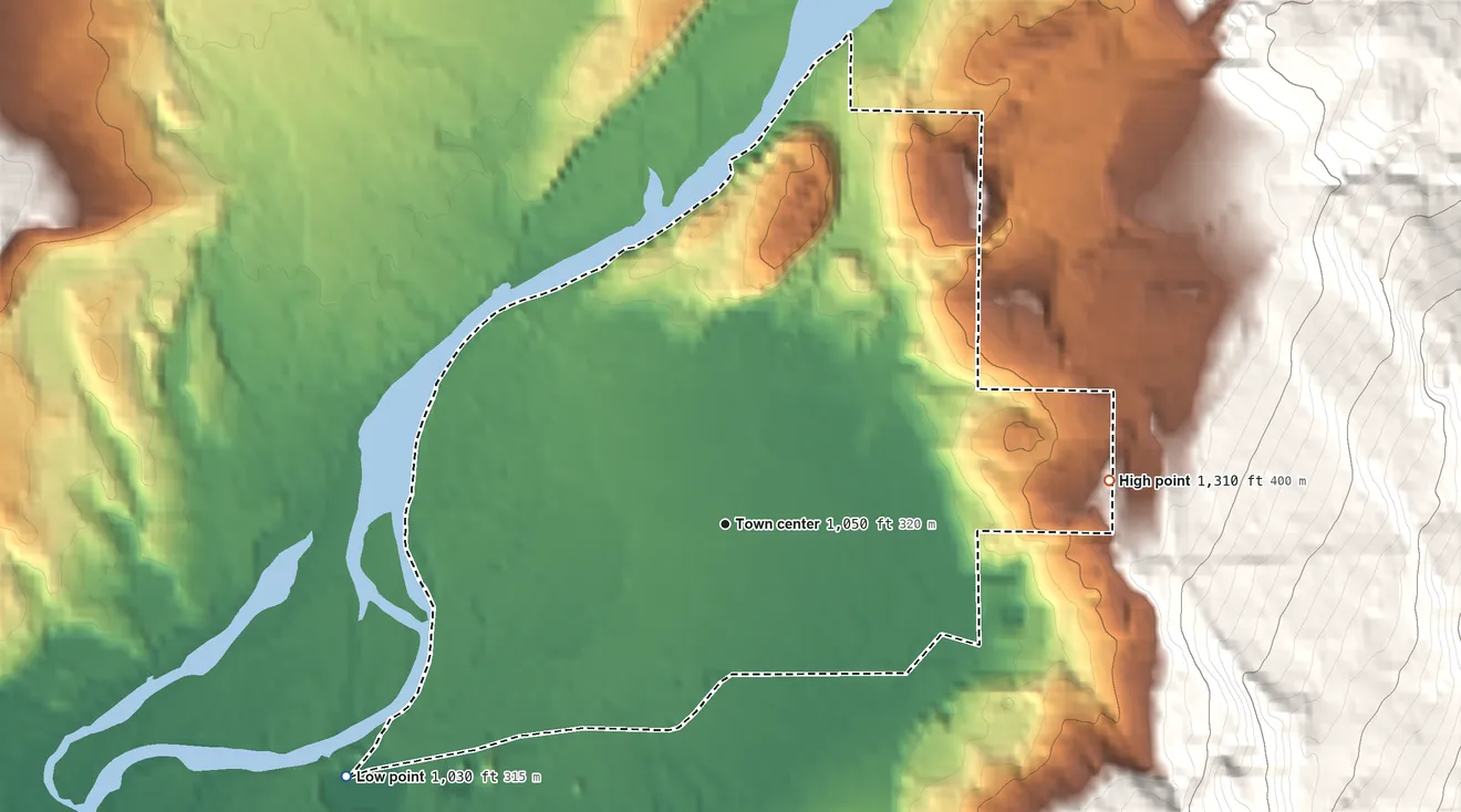 Topographic elevation map of Packwood, Washington, shaded from 1,030 ft on the southwest side to 1,310 ft at the foot of the Tatoosh Range