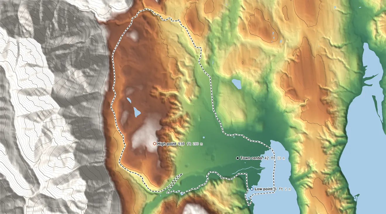Topographic elevation map of Quilcene, Washington, shaded from 6 ft on the southeast side to 930 ft at the foot of the Quilcene Range