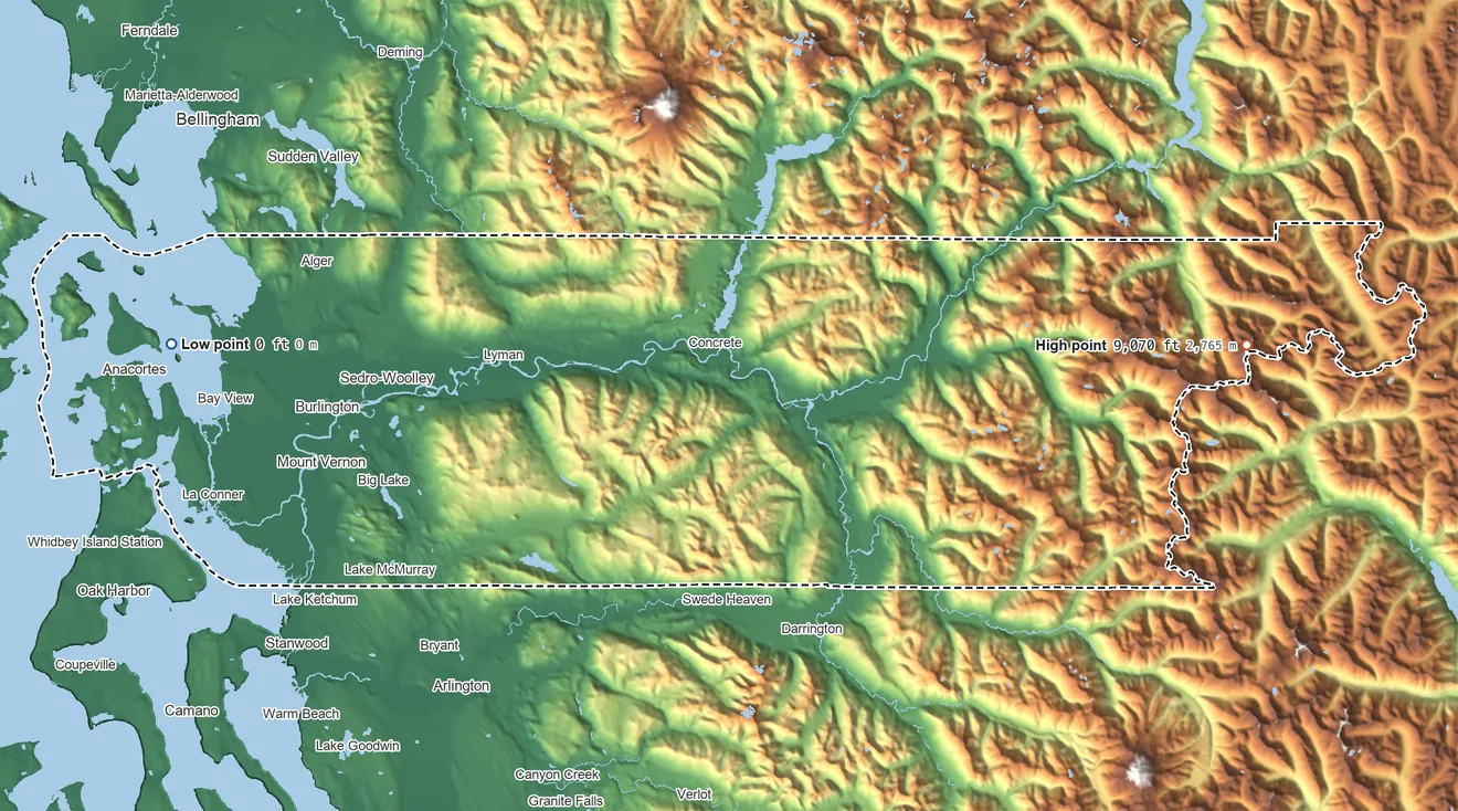 Topographic elevation map of Skagit County, Washington, shaded from sea level on the Salish Sea to 9,070 ft on Mount Logan